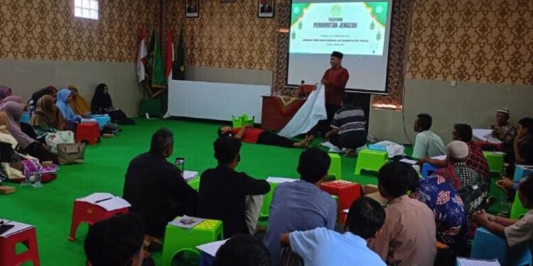 LDII Kabupaten Tegal pelatihan perawatan jenazah yang digelar di Gedung Serbaguna Al Huda Mansyurin, Tegal. Foto: LINES.