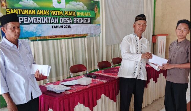 Pemerintah Desa Bringin bersama Pimpinan Anak Cabang LDII Desa Bringin salurkan bantuan untuk yatim dan dhuafa. Foto: LINES.