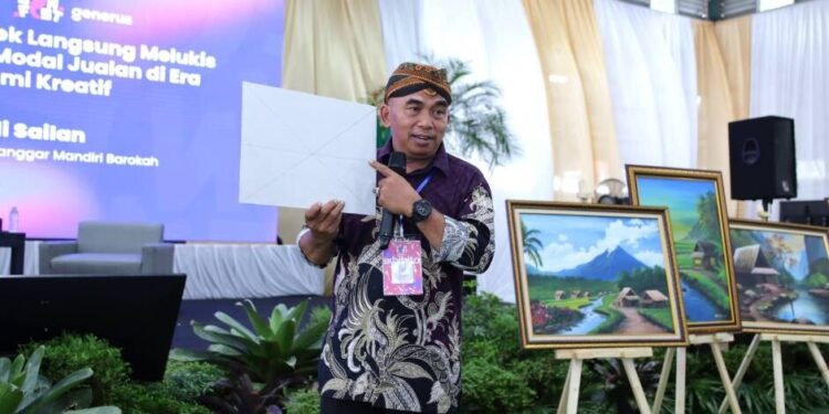 Workshop melukis di GenFest Munas X LDII oleh Andi Sailan, pendiri Sanggar Mandiri Barokah. Foto: LINES.